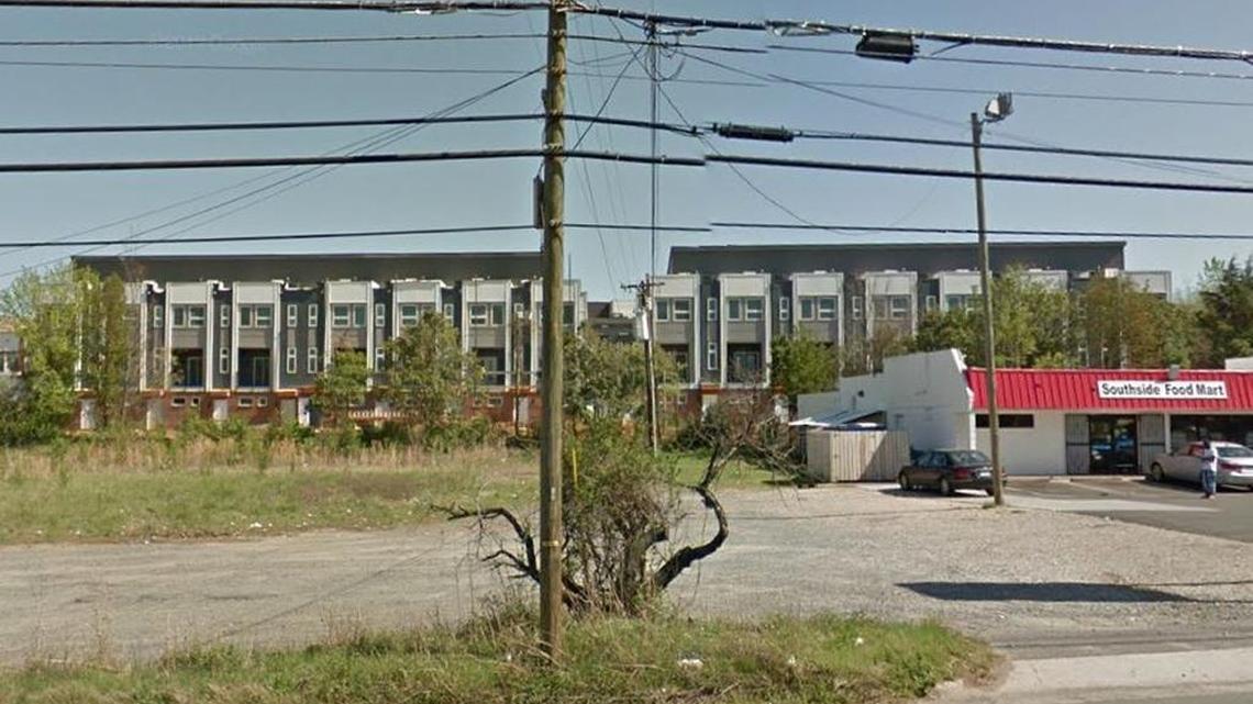 South Tryon Street, the site of a future self-storage facility. New apartments adjacent to the light rail are visible in the rear.