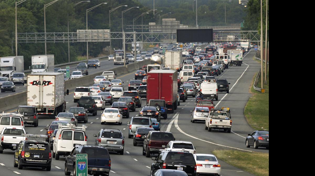 
Early morning traffic on inbound Interstate 77 near uptown Charlotte on June 26, 2015. 
