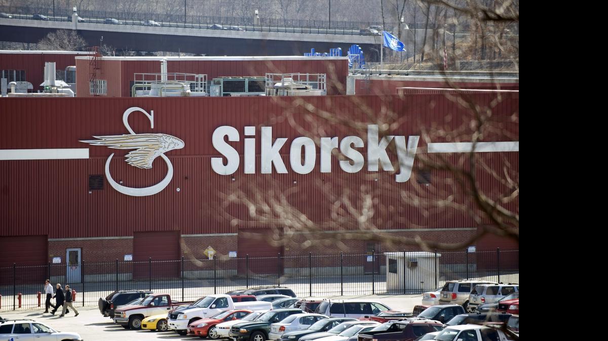 
Workers walk outside of Sikorsky Aircraft, in Stratford, Conn., in this March 2009 photo. United Technologies Corp. has announced it will separate the Sikorksy Aircraft business as it exits the helicopter business. 
