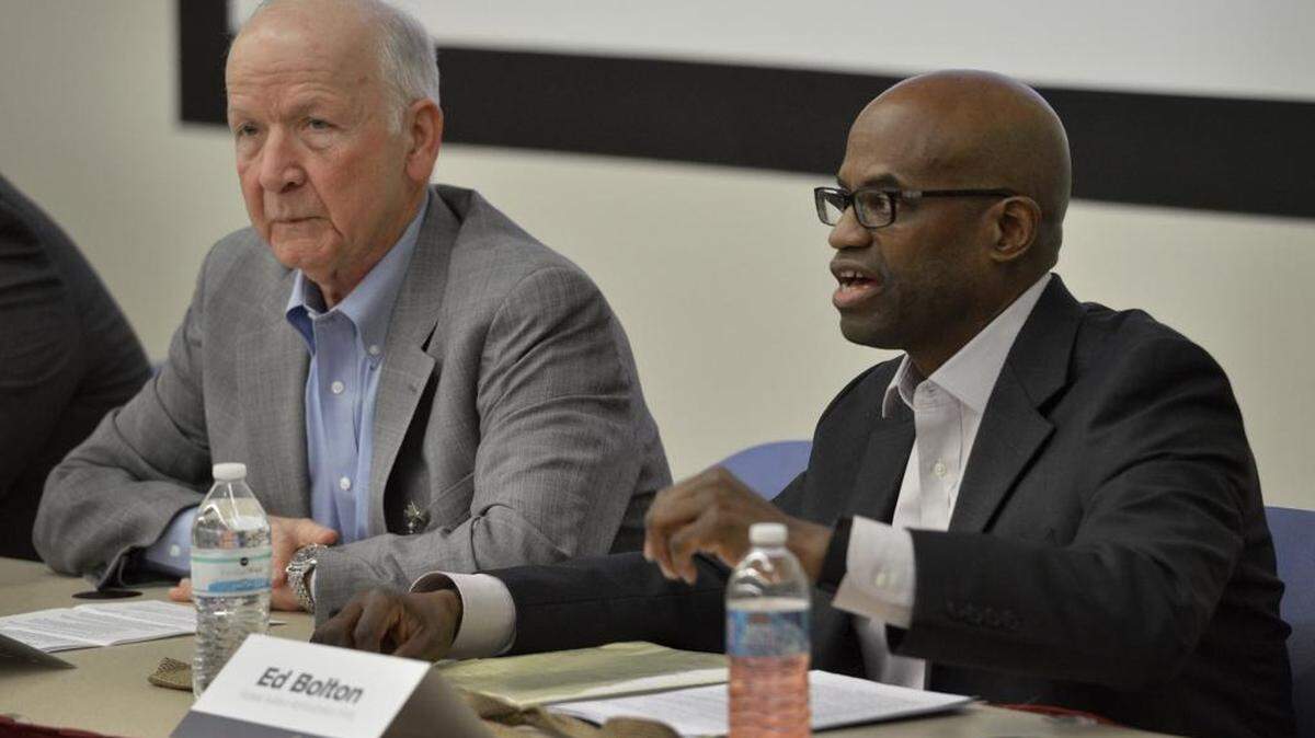 Edward Bolton, right, an assistant administrator with the Federal Aviation Administration, discusses plans to modernize the air traffic control system at Charlotte Douglas International Airport on Friday, Jan. 8, 2016. To his left is Lorne Cass, vice president of American Airlines’ Integrated Operations Center.