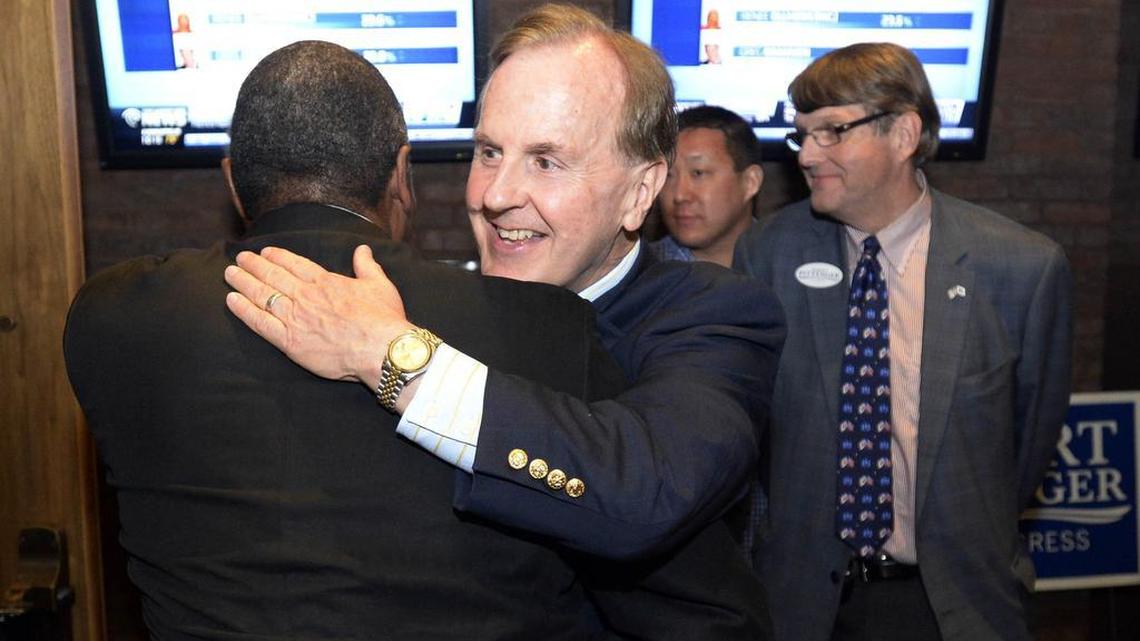U.S. Rep. Robert Pittenger hugs a supporter at his election returns party after a close Republican primary win in June.