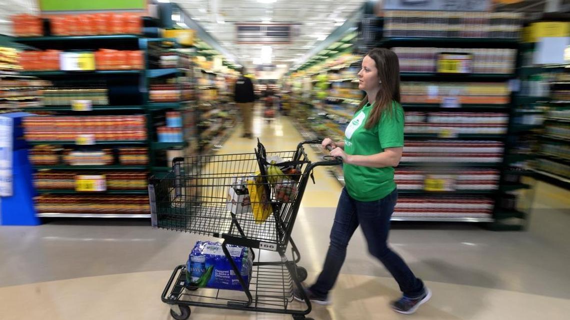 Jenna Greenwood, a Shipt Shopper, shops at the Ballantyne Harris Teeter earlier this year.