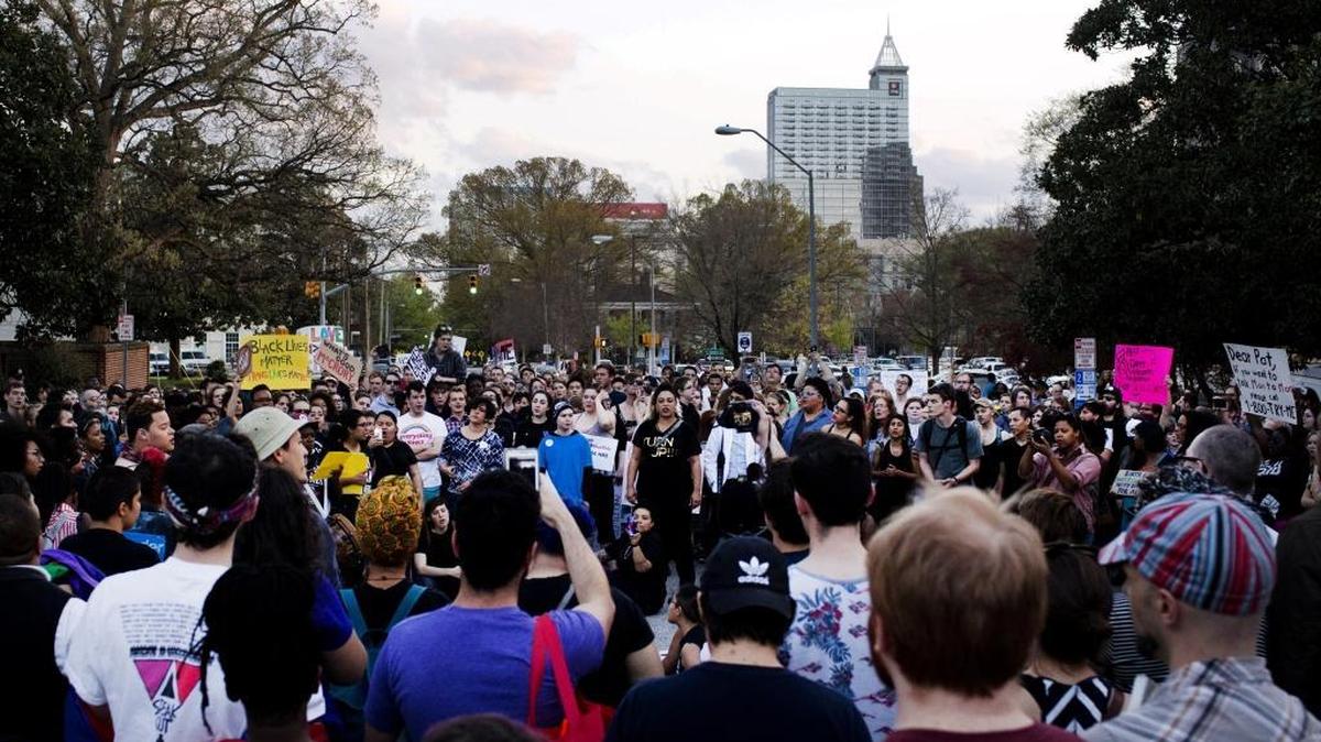 Protestors block Blount Street during a protest against House Bill 2 Thursday, March 24, 2016 outside of the Governors Mansion on North Blount Street in downtown Raleigh, N.C.