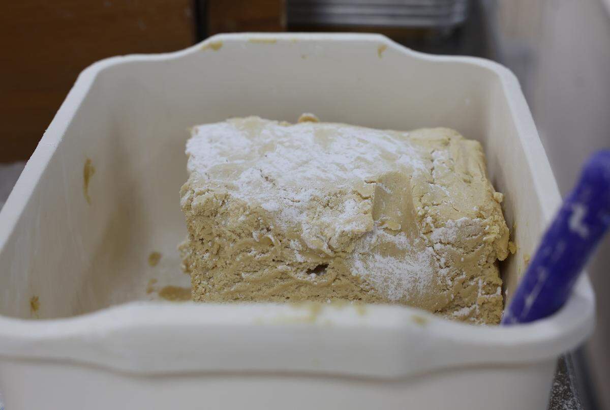 A container of cookie dough will be rolled and cut into heart shapes at Mrs. Hanes’ Moravian Cookies on Wednesday, Nov. 19.