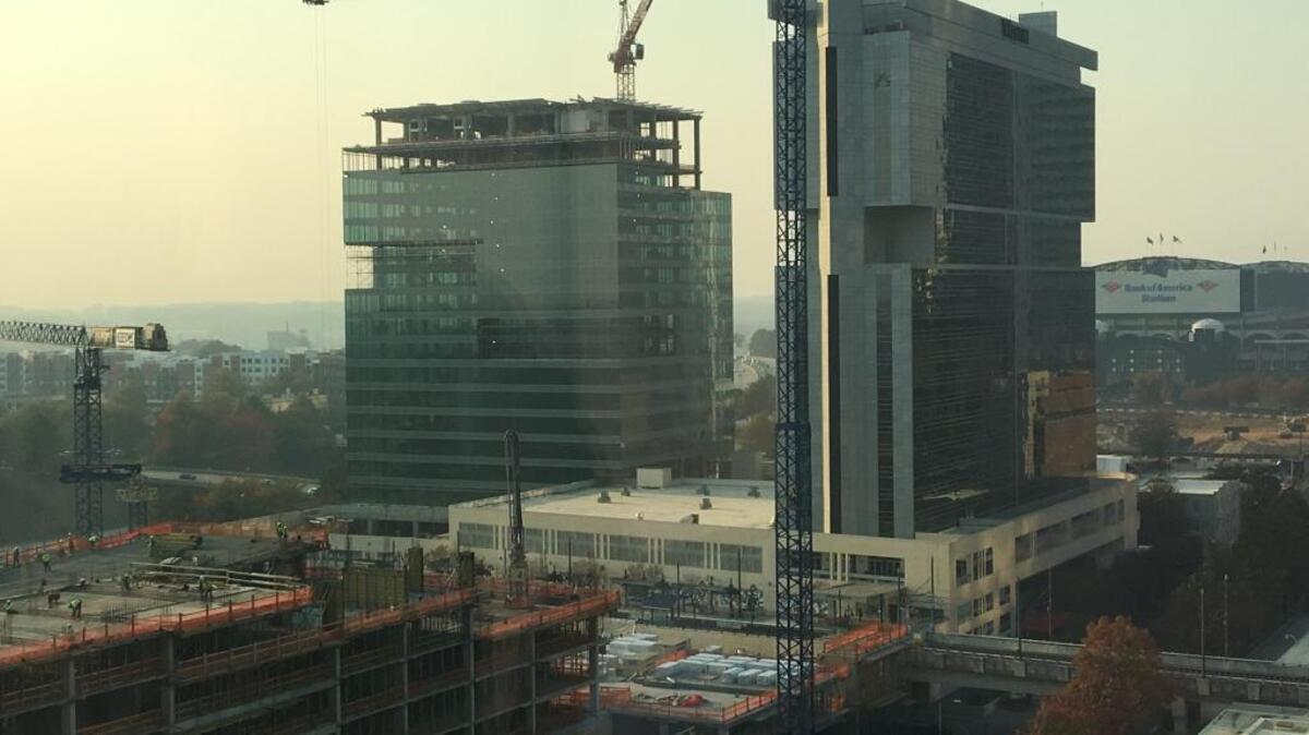 Before choosing Richmond, Va., real estate research firm CoStar Group was looking to take space at the 615 South College office tower (center) currently under construction in uptown.