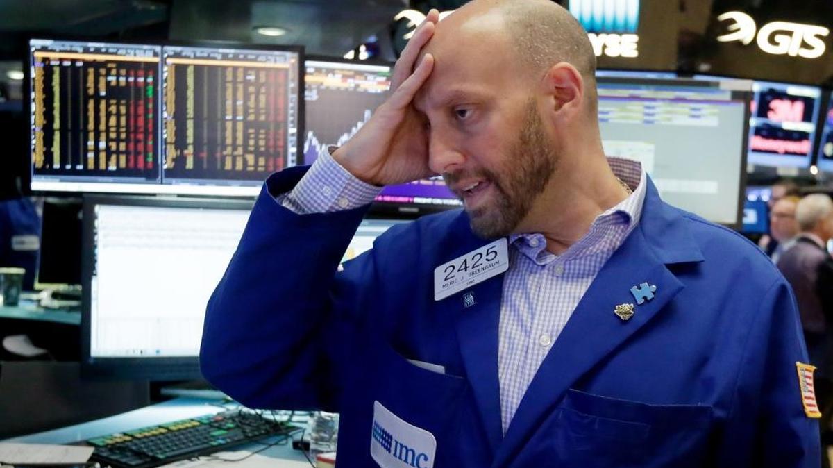 Specialist Meric Greenbaum works at his post on the floor of the New York Stock Exchange, Friday, June 24, 2016. U.S. stocks plunged after Britons voted to leave the European Union.