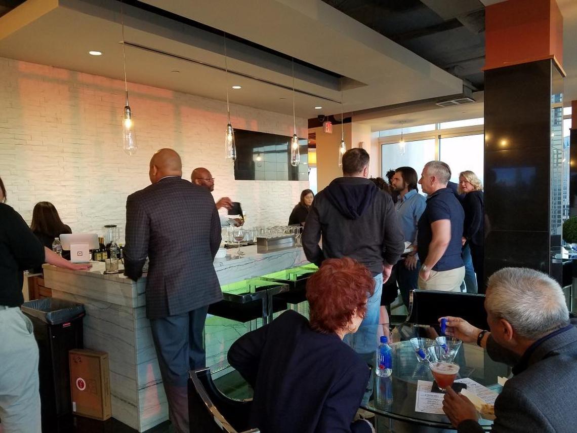 Residents and guests at the Sky Lounge bar, on the 50th floor of The Vue apartments.