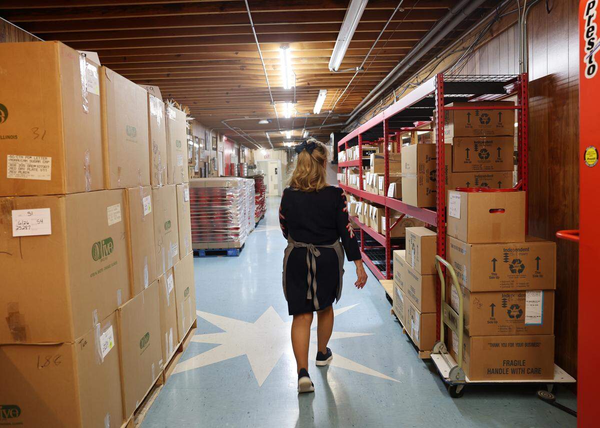 Ramona Templin of Mrs. Hanes’ Moravian Cookies walks through part of the business on Wednesday, Nov. 19.
