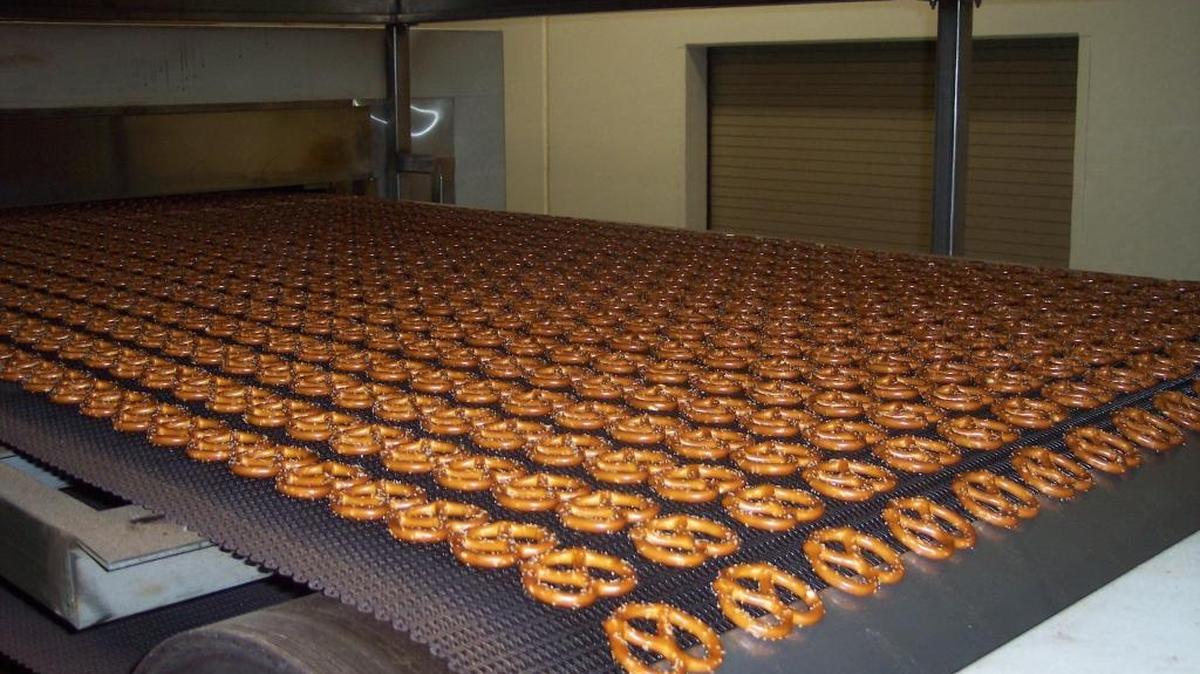Pretzels coming off a Snyder’s-Lance conveyer belt.