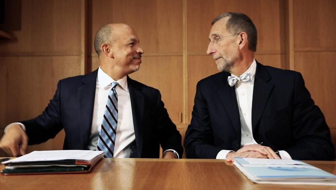Carolina HealthCare System CEO Gene Woods, left, and UNC Health Care CEO William Roper announce their plans to create a nonprofit hospital corporation in this file photo.
