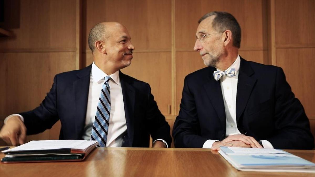 Carolina HealthCare System CEO Gene Woods, left, and UNC Health Care CEO William Roper announce their plans to create a nonprofit hospital corporation in this file photo.