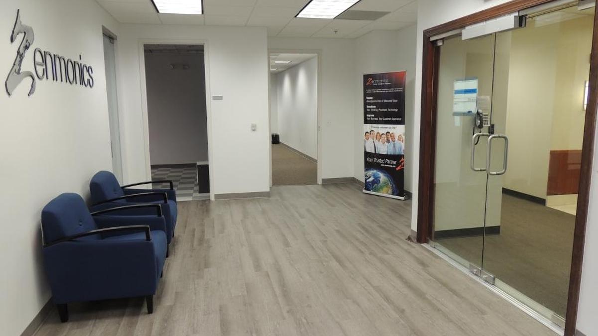 Recent renovations at Zenmonics, Inc. include this new reception area. The global information technology company was named a 2015 Top Workplace.