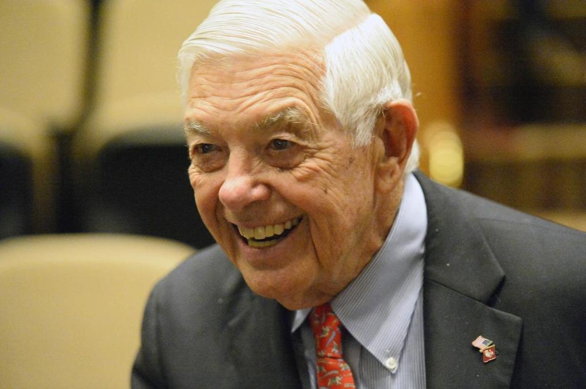 Former Bank of America Chairman and CEO Hugh McColl Jr., shares a laugh with audience members after a Charlotte-Mecklenburg Opportunity Task Force presentation in March.