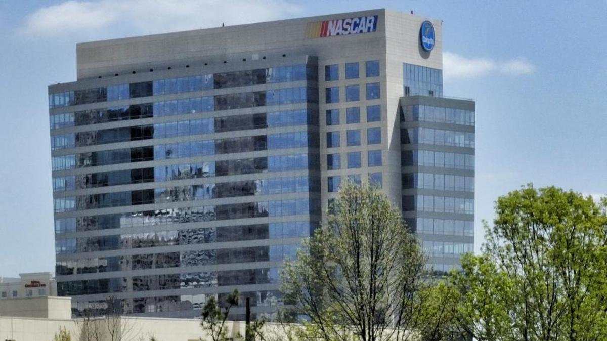 The NASCAR Plaza building, at Stonewall and South Caldwell streets. NASCAR is cutting dozens of jobs amid a proposed bid to buy International Speedway Corporation, which owns and manage racing facilities that host NASCAR races.