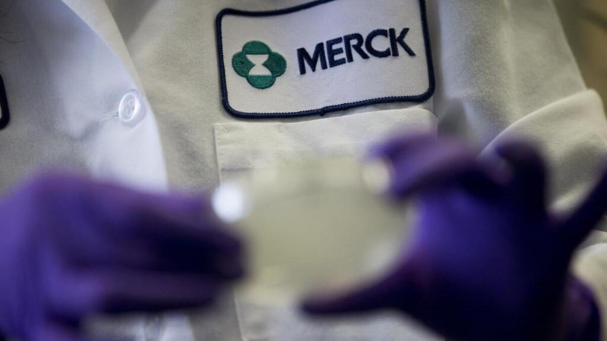 In this file photo, a Merck scientist conducts research in West Point, Pa.
