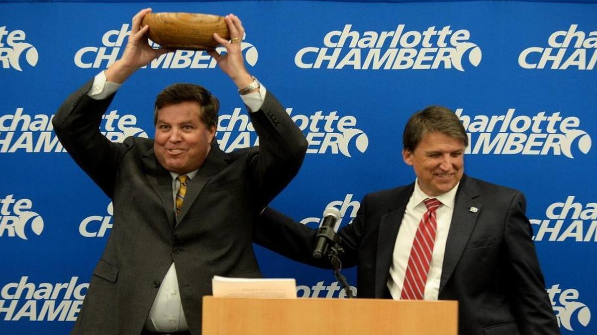 Charlotte competed with Tampa, Fla., and Chandler, Ariz., for a PayPal operations center that is now leaving the city over a new state law that limits LGBT protections, according to minutes of a closed-session county commission meeting. In this photo, PayPal’s John McCabe and Gov. Pat McCrory celebrate the company’s earlier plans to expand in Charlotte.