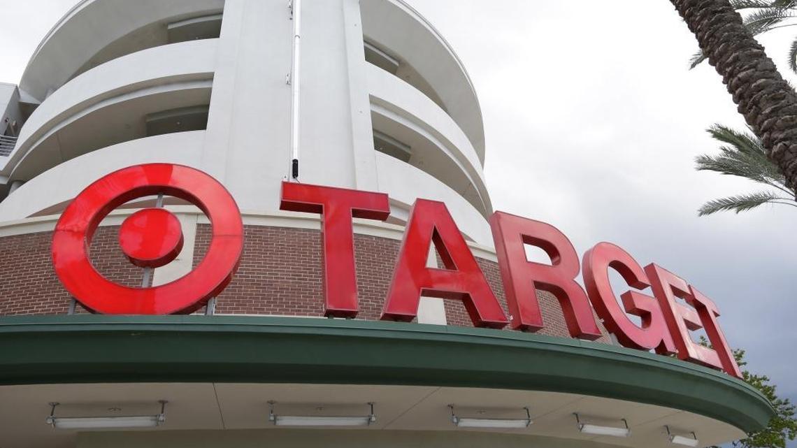 This Monday, Aug. 11, 2015, file photo shows a Target store in Miami. Target is making a stand on the debate around what type of bathrooms transgender people can use. In a statement posted on its company website Tuesday, April 19, 2016, the discounter, based in Minneapolis, said transgender employees and customers can use the restroom or fitting room facility that "corresponds with their gender identity."