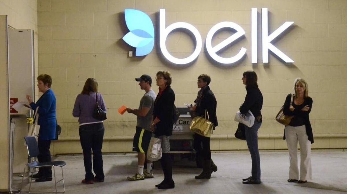 Customers wait in line to check in line to take part in Belk’s Charity Day sale at SouthPark Mall on Nov. 9, 2013.