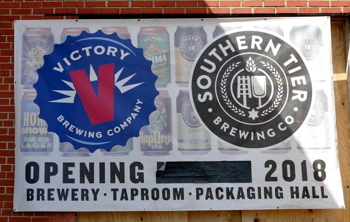 A sign on the exterior of new brewery under construction in South End.