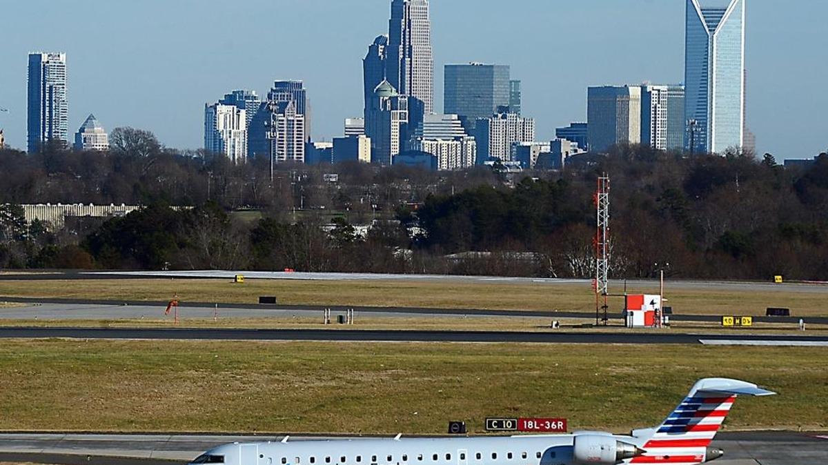 An American Eagle jet taxis to the terminal at Charlotte Douglas International Airport on Dec. 17, 2014.