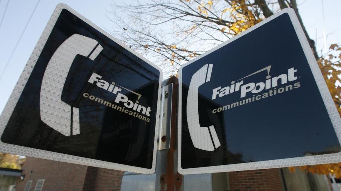 FairPoint Communications Inc. signs are seen in Montpelier, Vt., Oct. 26, 2009. Charlotte-based FairPoint announced Monday it is being purchased for $1.5 billion by an Illinois telecommunications company called Consolidated Communications.