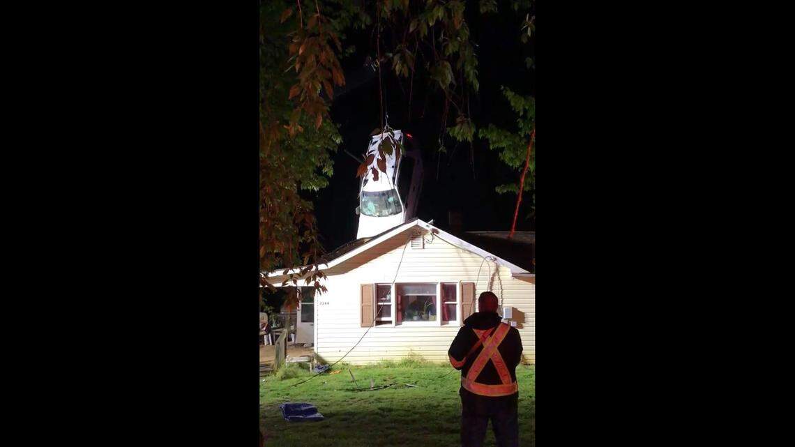 An SUV flew into the roof of a home in Yadkin County, North Carolina, officials said.