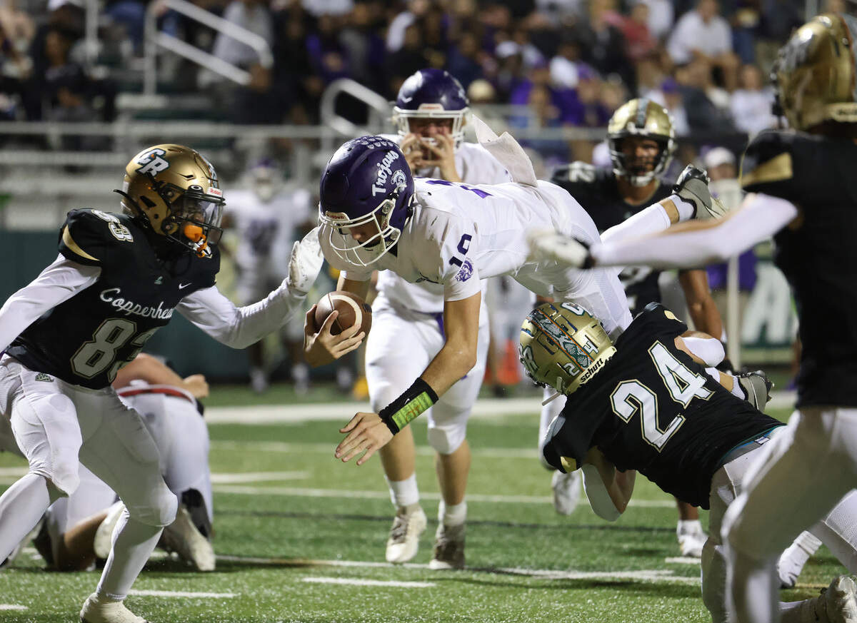 Northwestern quarterback Finley Polk dives into the endzone for a touchdown Friday, Sept. 27, 2024 as the Trojans competed with Catawba Ridge High School in varsity football.