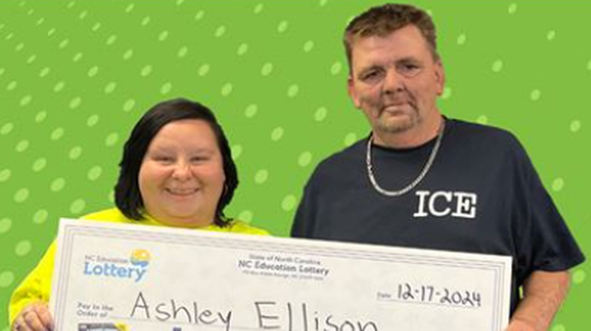 Ashley Ellison, pictured with her uncle Mike Hughey, was in disbelief after she hit the jackpot.