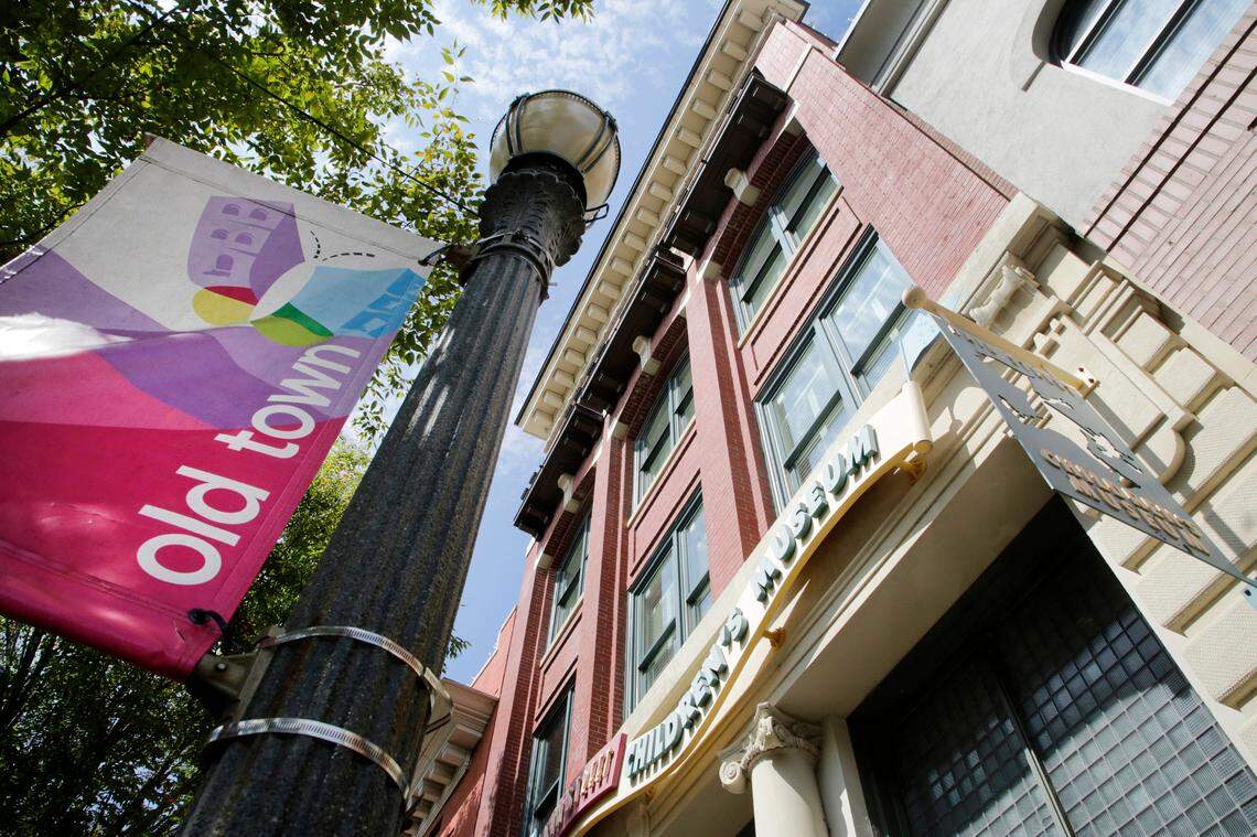 An “Old Town” flag hangs near the Children’s Museum in downtown Rock Hill on Thursday. New U.S. Census Bureau data shows how Rock Hill compares with the biggest cities in South Carolina and Charlotte.