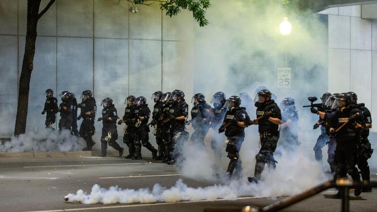 Charlotte Mecklenburg Police kick tear gas down the street as they disperse protesters along College Street on May 30, 2020. Several days later, on June 2, CMPD officers corralled a group of peaceful protesters and sprayed them with tear gas.
