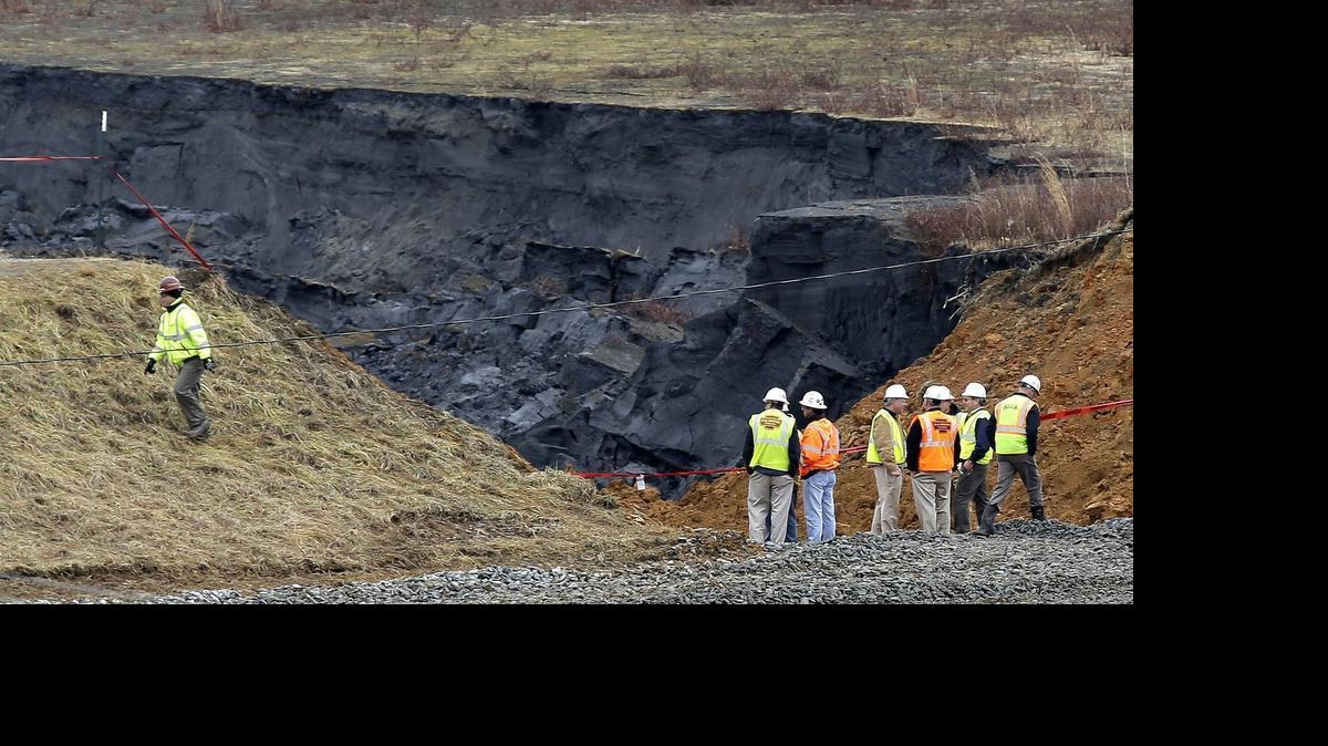 
Duke Energy engineers and contractors survey the site of a February 2014 coal ash spill at the Dan River power plant in Eden. 
