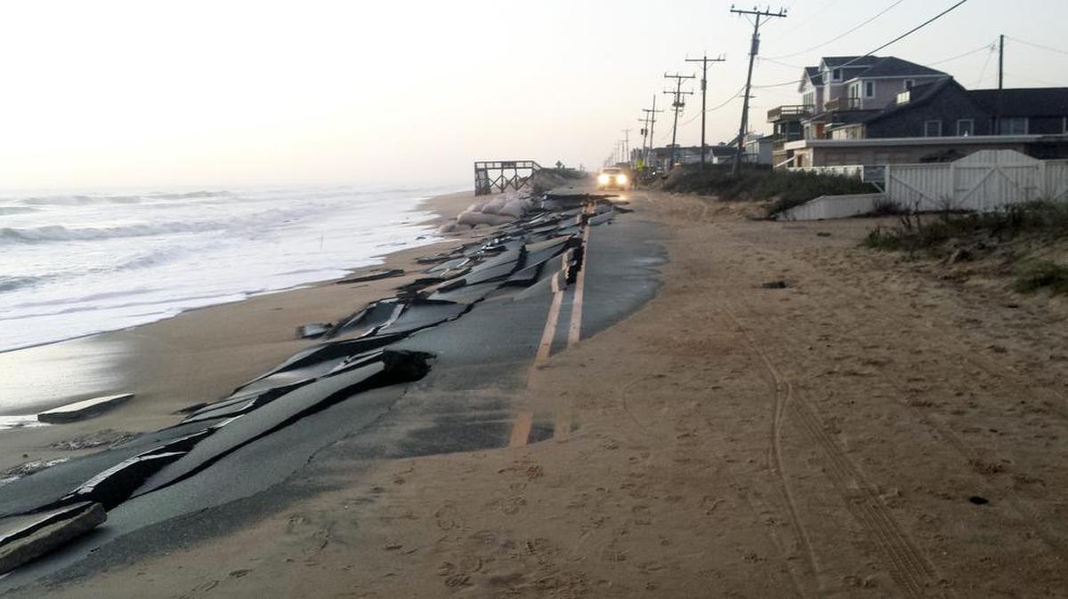A few hundred yards of N.C. 12 and its protective dunes will be rebuilt at Kitty Hawk, to repair damage caused in early October by Hurricane Joaquin.