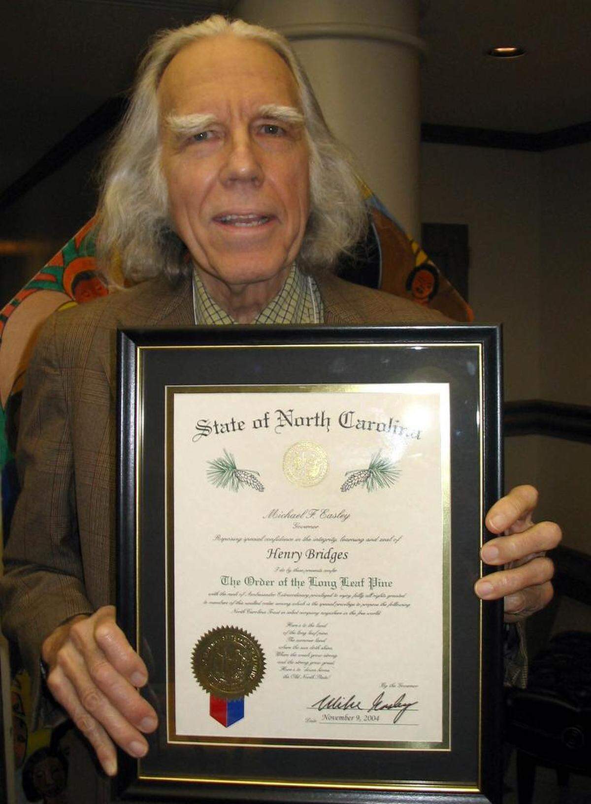 Henry Bridges, who won the Order of the Long Leaf Pine for his role in founding and supporting the Community School of the Arts, in 2005. Bridges died on Tuesday.