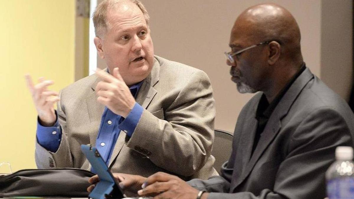 Mecklenburg County Commissioners Bill James (left) and George Dunlap both support extending board terms from two to four years.