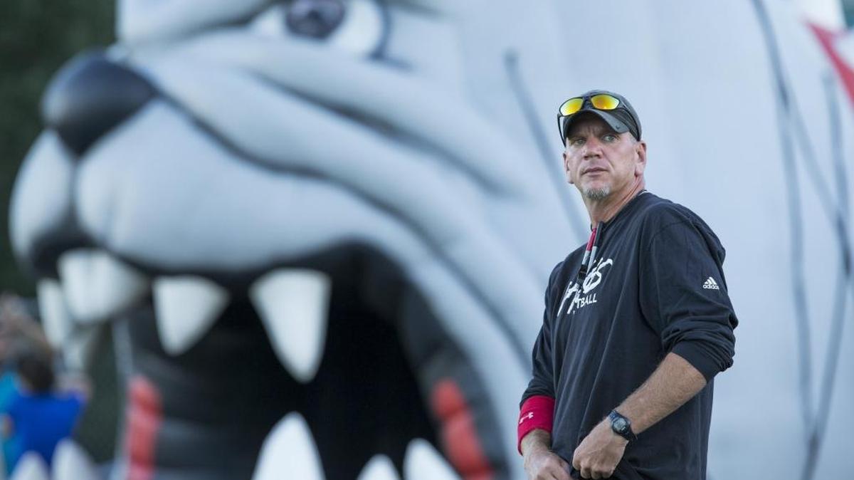 Butler head coach Brian Hales is seen on the sidelines before facing East Meck in a September game.