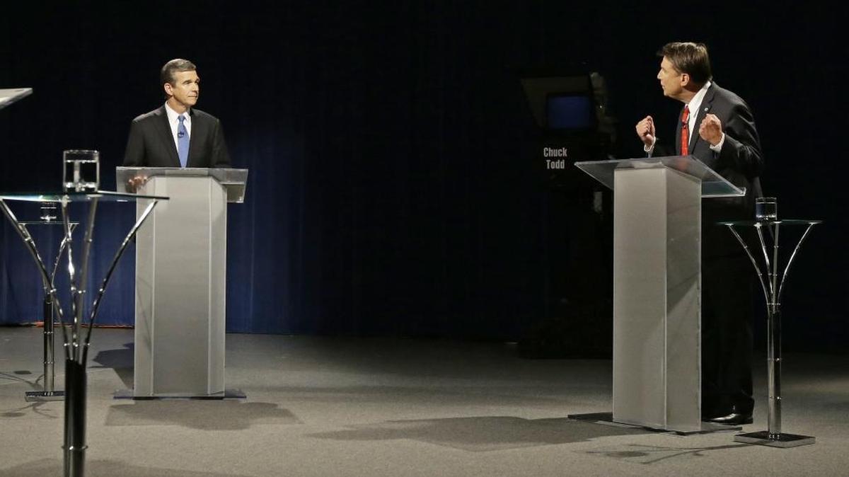 Democratic challenger Roy Cooper (left) and Republican Gov. Pat McCrory at an October debate.