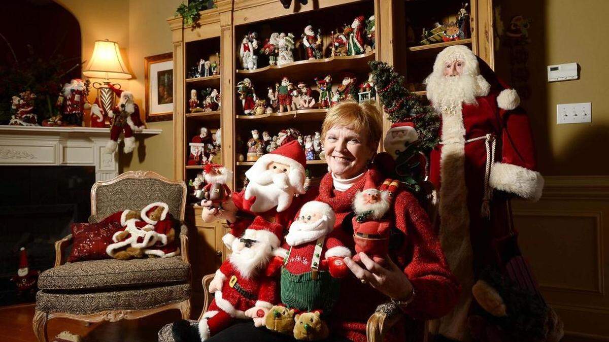 Nancy Kudwam who lives Lake Wylie in York County, S.C., with a few of her Santas on Dec. 19,2015, she has over 1,000 Santas at her home, she's been collecting them for 41 years.