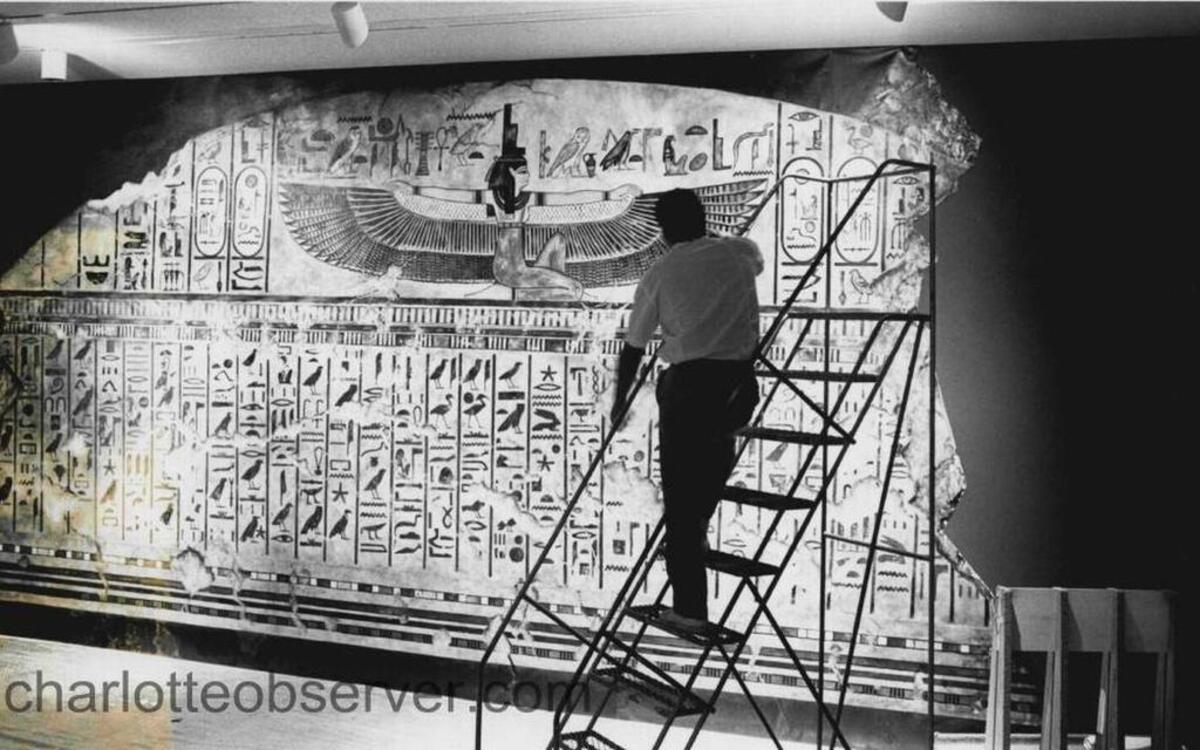 Museum worker prepares Ramesses II exhibition display in August, 1988. Jeep Hunter The Charlotte Observer