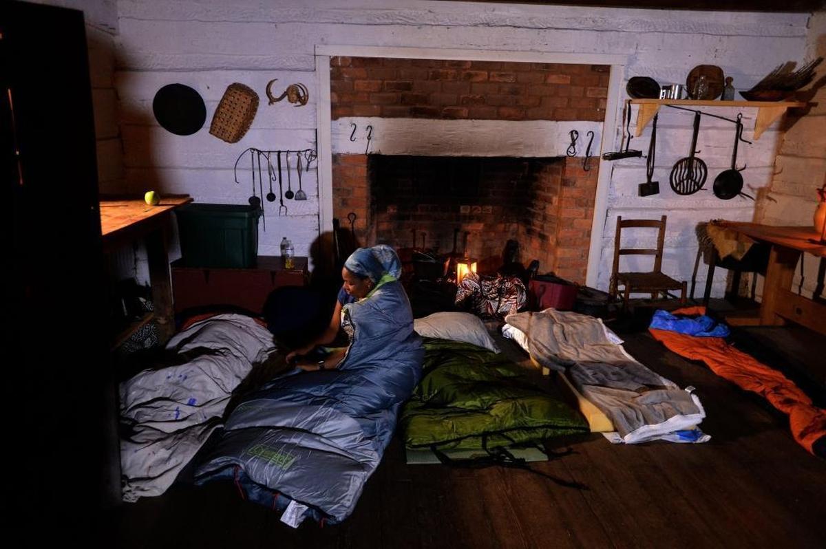 A Charlotte area group hoping to deepen its understanding on the plight of enslaved people in America’s past spent the night sleeping on the floor of a crude cabin at the President James L. Polk Historic Site in Pineville. The group including African-Americans, whites and an Asian-American, and ranged in age from 13 to 81. The event was sponsored by the South Carolina-based Slave Dwelling Project.