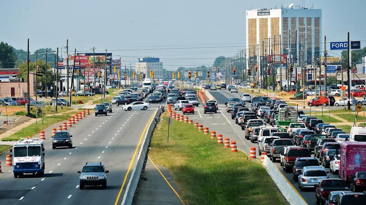 
The DOT is widening U.S. 74, and plans to include express toll lanes in the median when the project is finished. The state estimated the toll at peak travel times would be 26 cents a mile.
