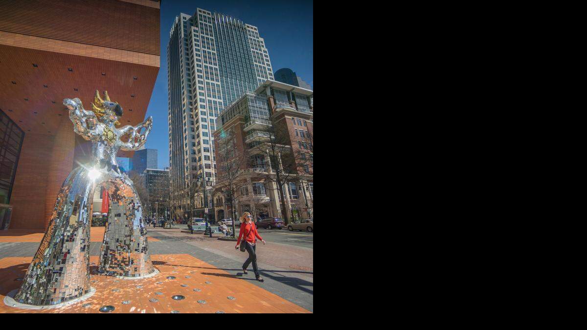 
The sun reflects off of the “Firebird” at the Bechtler Museum of Modern Art along South Tryon Street in uptown Charlotte on Thursday. It was a springlike day with temperatures rising into the 70s.
