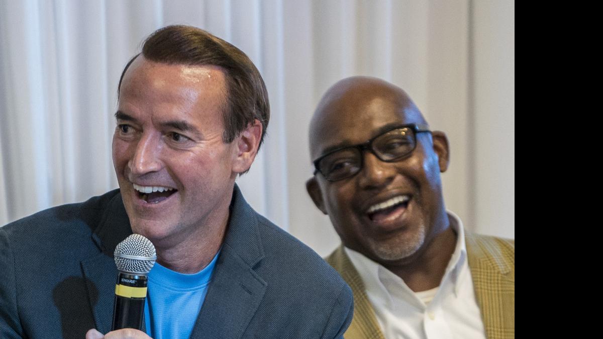 
Rev. Talbot Davis, pastor of Good Shepherd United Methodist Church, left, and the Rev. Percival Reeves, pastor of Sanctuary Charlotte Church react at a forum held at Sanctuary on Thursday night designed to build an interfaith, interracial coalition to move "from words to action" on racial justice.

