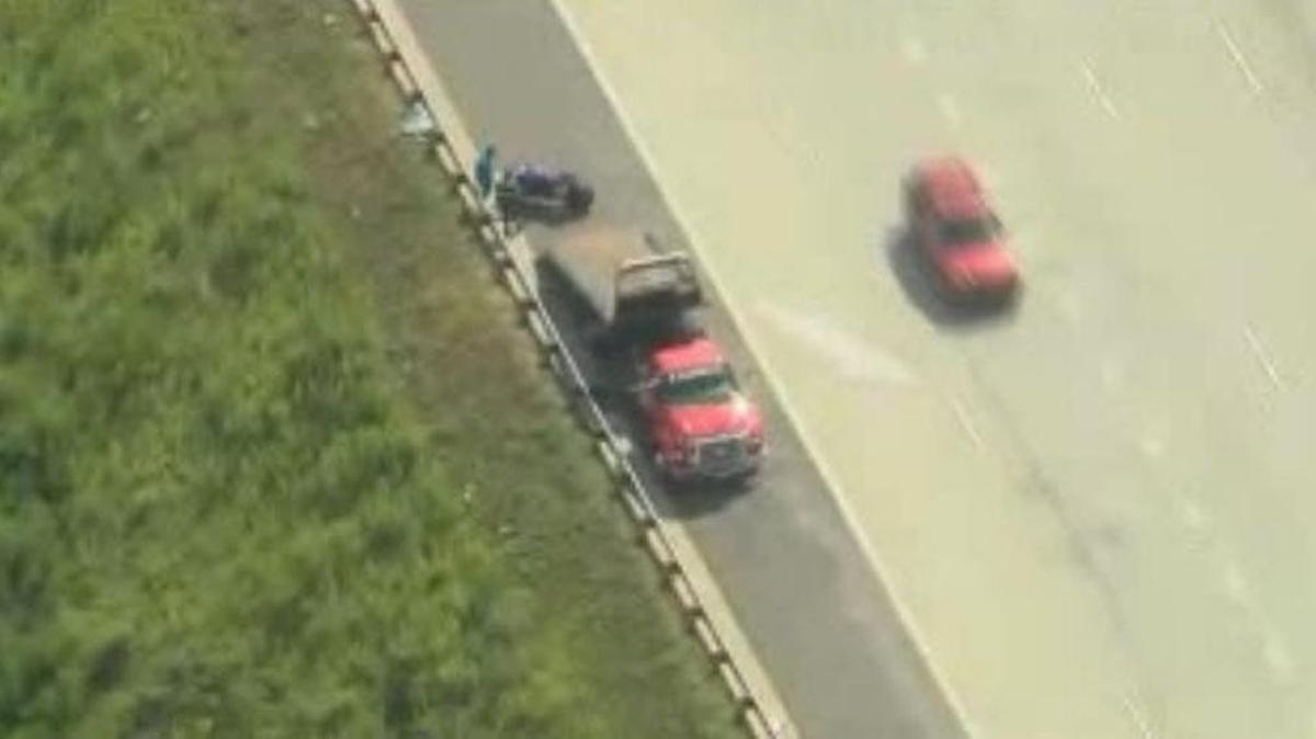 A motorcyclist was hospitalized with potentially life-threatening injuries after sheet metal fell from a truck and hit him on Interstate 85 northbound on Tuesday afternoon.
