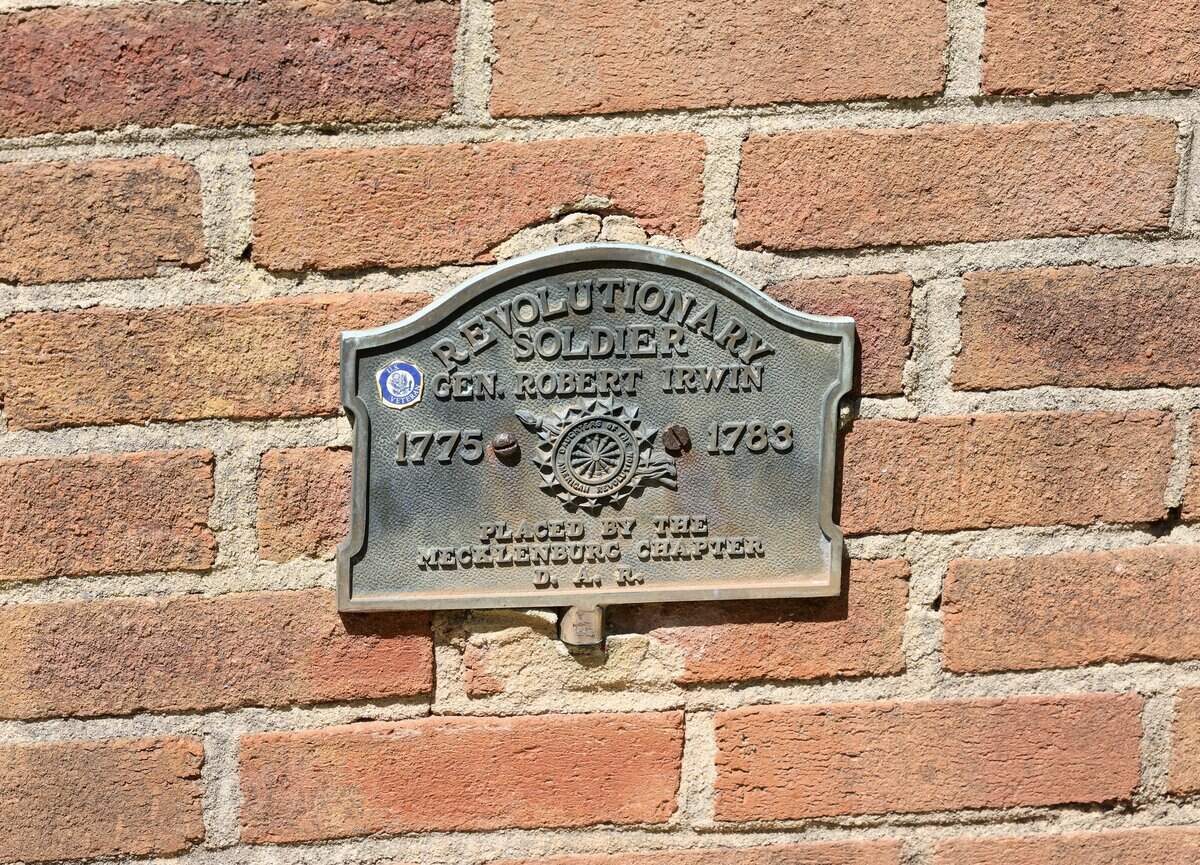 A marker describes a tomb as that of Revolutionary War soldier Gen. Robert Irwin in the Steele Creek Presbyterian Church in Charlotte.