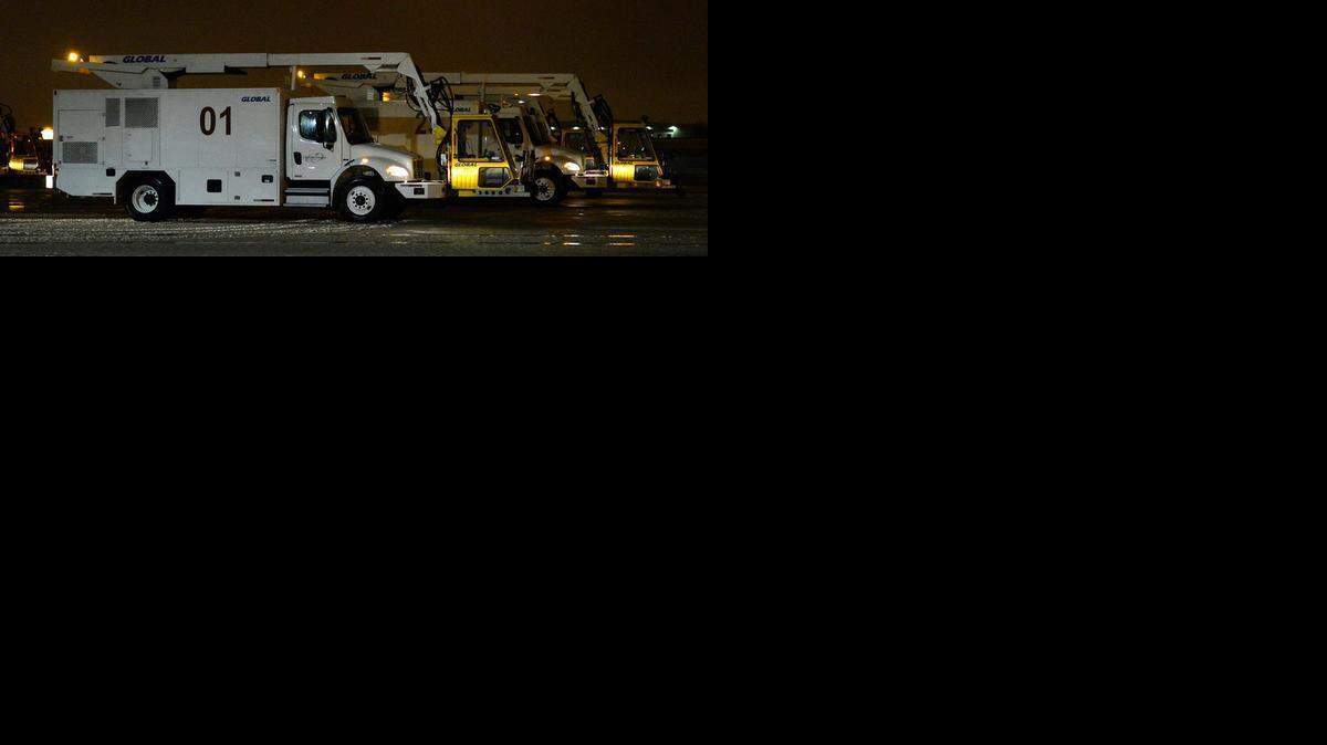 
De-icing trucks are standing by at Charlotte Douglas International Airport, but so far have not been needed Thursday morning. About 200 people spent the night in the terminal. Delta Airlines is boarding passengers and American Airlines flights are scheduled to begin around noon Thursday, Feb. 26, 2015.



