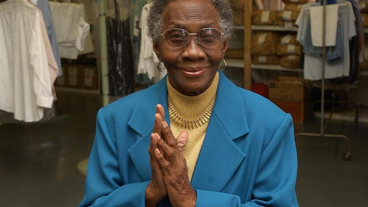 Lula Bell Houston stands inside the laundry building named for her on the Davidson College campus on Dec. 17, 2004.
