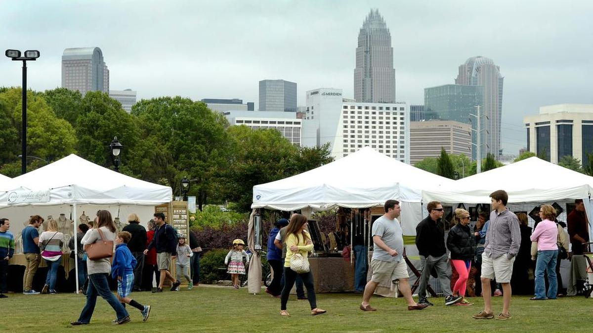 
Under cloudy skies, patrons of the 5th annual Kings Drive Art Walk visited artists’ booths and listened to music along the Little Sugar Creek Greenway this weekend.
