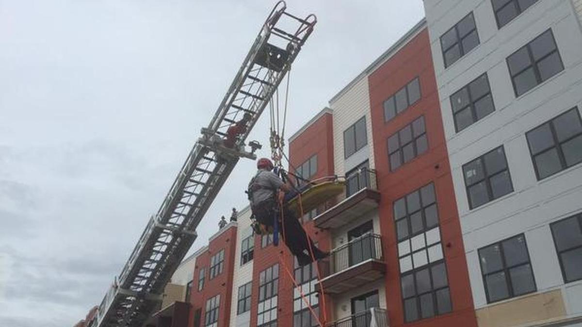 
Charlotte firefighters rescued an injured construction worker from the roof of a building at West Morehead and South Church streets Tuesday morning.

