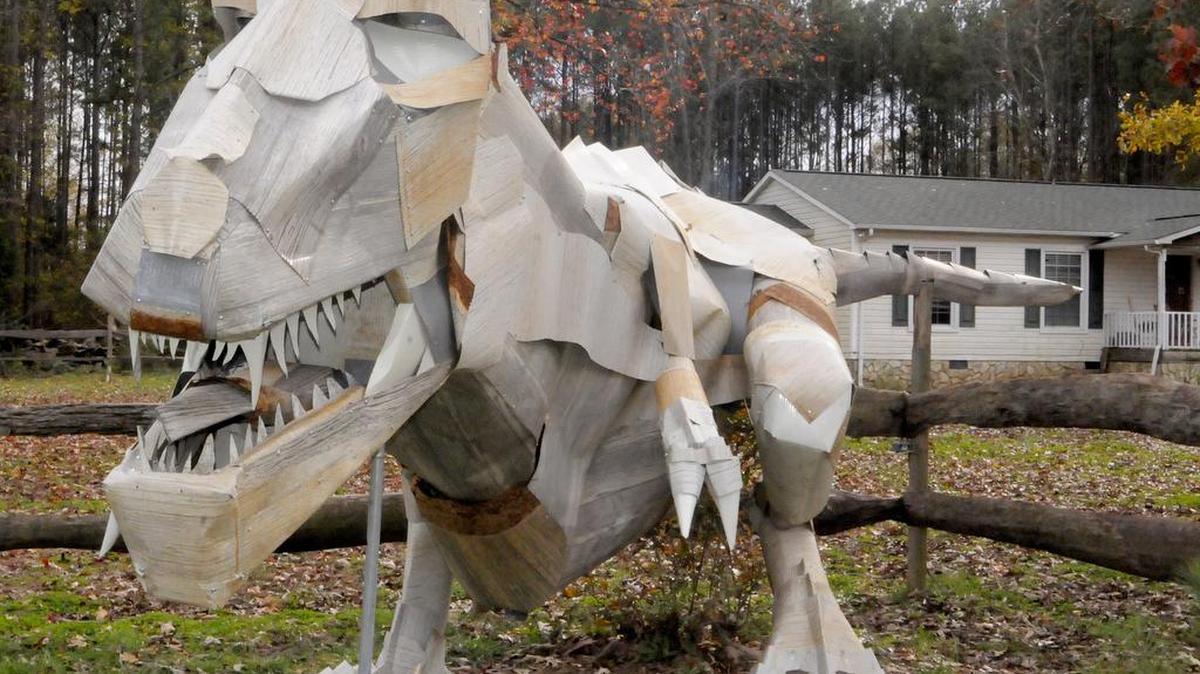 Pete Kohman built this T-Rex sculpture from galvanized steel in the front yard of his home near York.