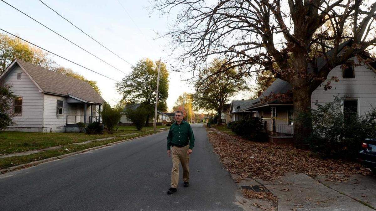 Jack Kiser, project manager, Loray Mill Village Neighborhood Revitalization with Preservation North Carolina, inspects mill houses in the Loray Mill Village that Preservation North Carolina has purchased for restoration. Kiser is former planning director for the city of Gastonia and has worked on the Loray Mill restoration project for 20 years.
